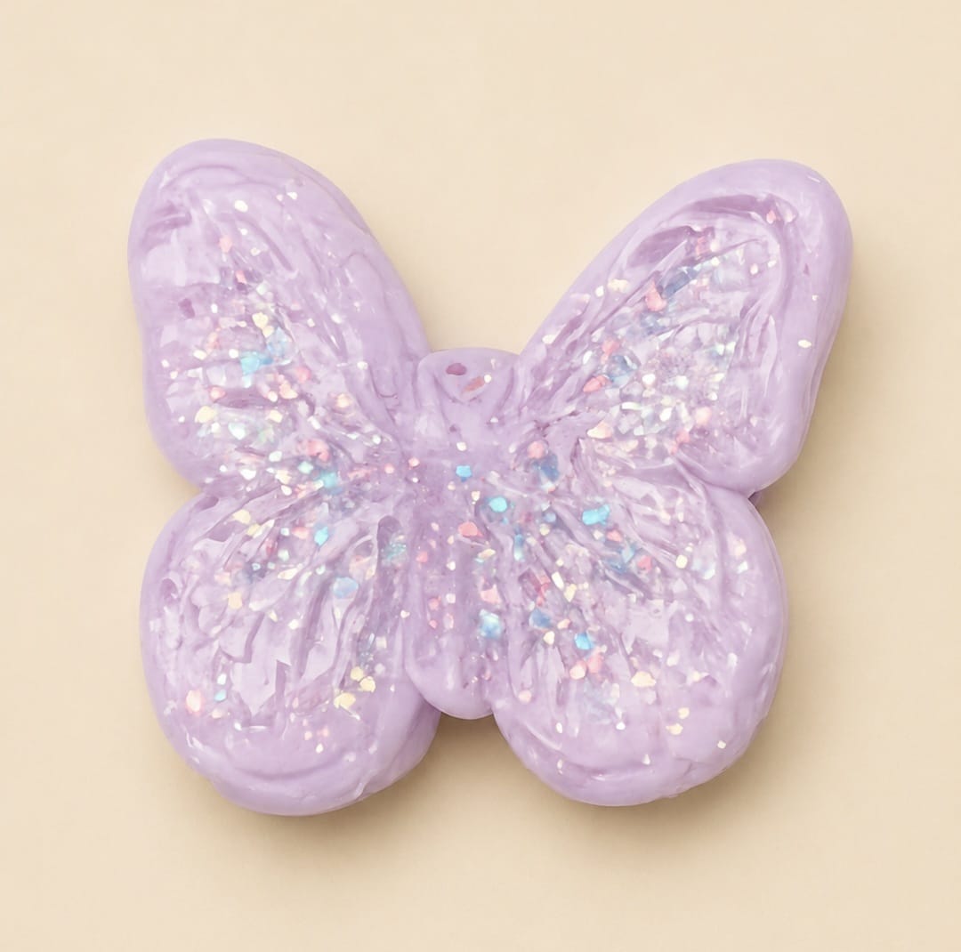 One random Glitter Butterfly Squishy Charm